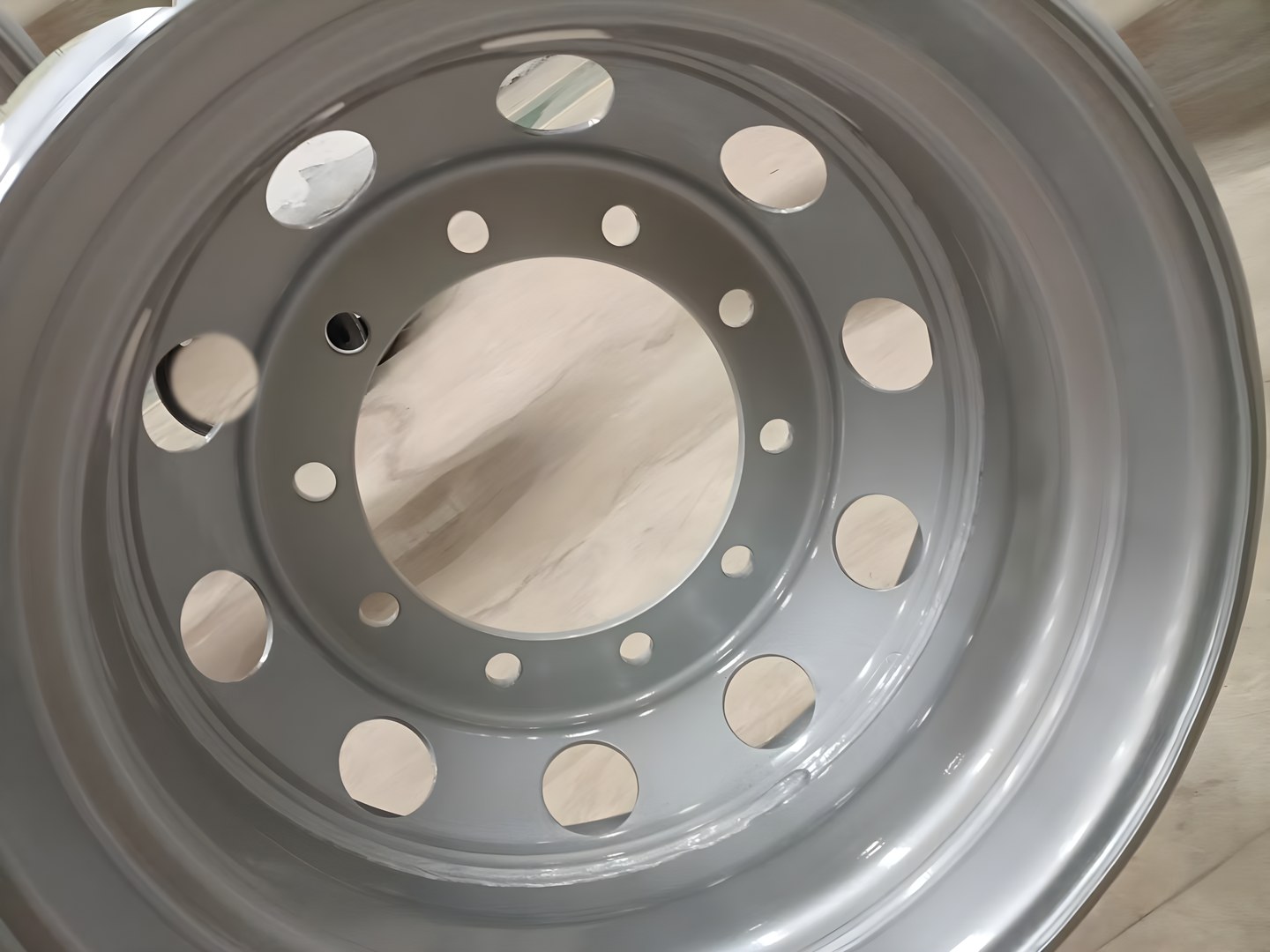 Bolt hole detail of a tubeless steel wheel